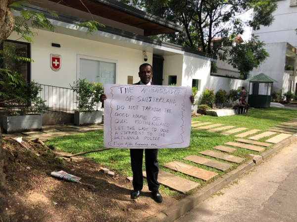 Former Politician Affiliated With SLPP Begins Fast Near Swiss Embassy Demanding &quot;Abducted&quot; Staff Member Is Produced Before Police